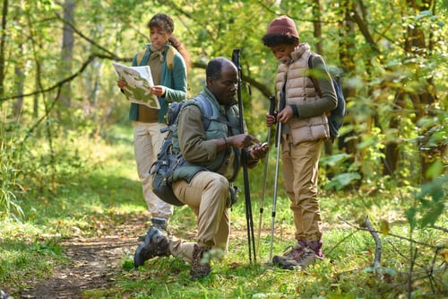 Preview: Father Teaching Son How to Use Compass