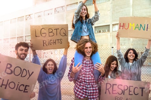 Preview: Group of diverse people marching for LGBT rights holding banners. Protesters march for LGBTQ rights.