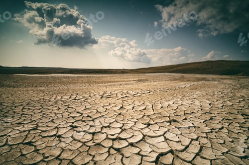 Preview: Cracked Earth Landscape with Moody Sky and Clouds