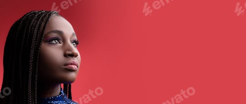 Preview: Young girl in a glittery blue outfit gazes thoughtfully against a red background