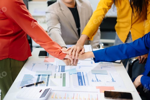 Preview: Business partnership handshake concept.Photo two coworkers handshaking process.