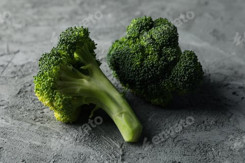 Preview: Broccoli on grey background, close up. Healthy food