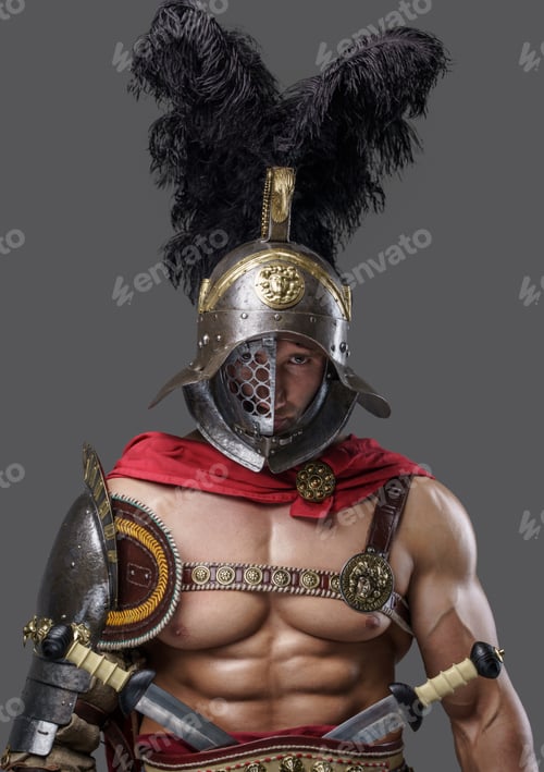 Preview: Muscular roman gladiator looking at camera against grey background