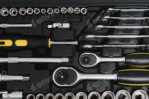 Preview: Set of assorted work carpentry and locksmith tools on a dark wooden background with copy space