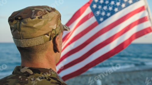 Preview: Military next to flag as patriotism concept