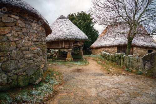 Preview: Light frost on the thatched roofs of the Piornedo pallozas