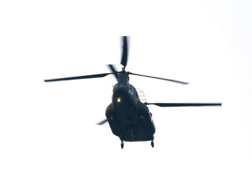 Preview: Close up of military transport helicopter isolated on white background