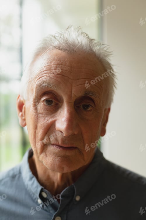 Preview: Portrait of active senior Caucasian man standing in the porch at home