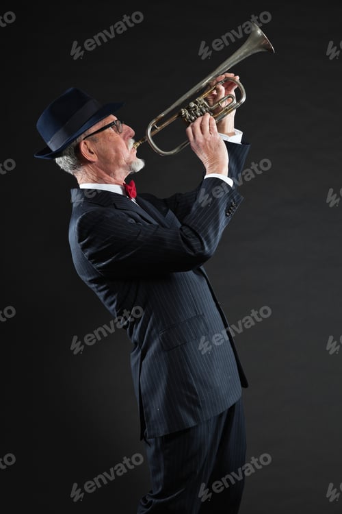 Preview: Senior Jazz Musician. Trumpet Player. Studio Shot.