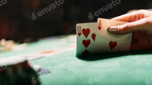 Preview: cropped image of woman playing poker and holding cards in casino