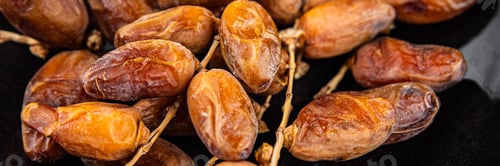 Preview: date on a branch dried sweet fruit fresh appetizer meal food snack on the table copy space food