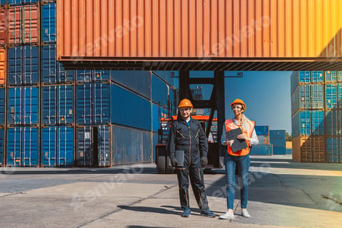 Preview: Workers male and female doing work with logistic cargo container import and export industries.
