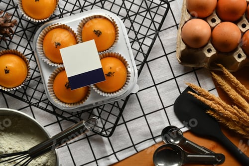 Preview: Chinese pastry with stuffed salted yolk on wooden kitchen table