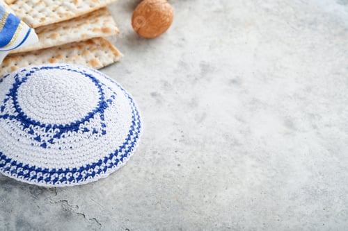 Preview: Passover celebration concept. Matzah, red kosher and walnut. Traditional ritual Jewish bread matzah,