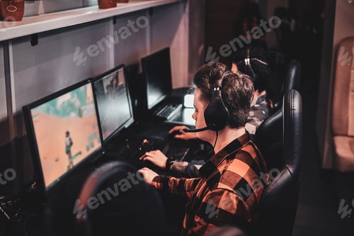 Preview: People are playing videogames at cyber club