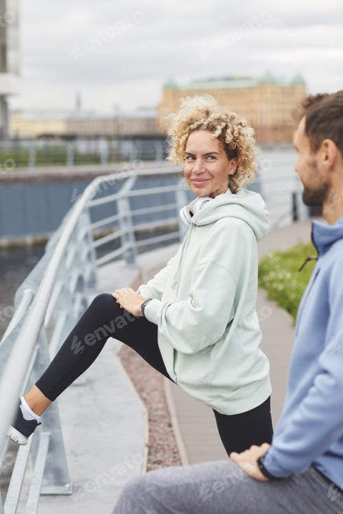 Preview: Woman exercising with man