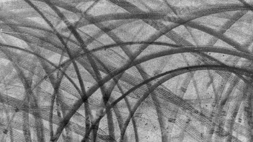 Preview: Aerial view tire track mark on asphalt tarmac road race track texture and background.