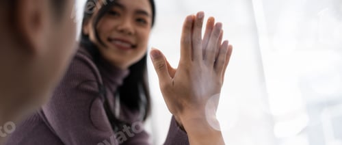 Preview: business team people give high five happy excited in teambuilding celebrate corporate teamwork
