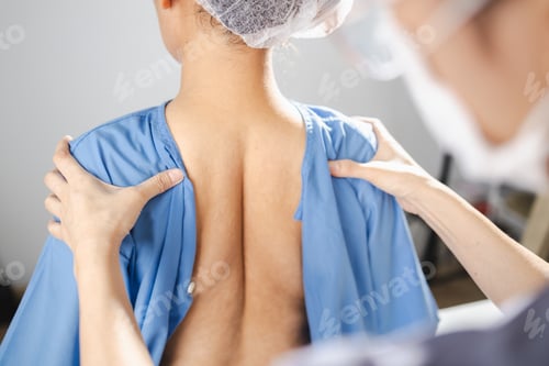 Preview: Physical therapy, healthcare professional provides physical therapy to patient