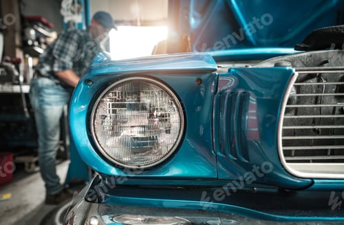 Preview: Classic Cars Restoration Worker Next to His Restored Vehicle