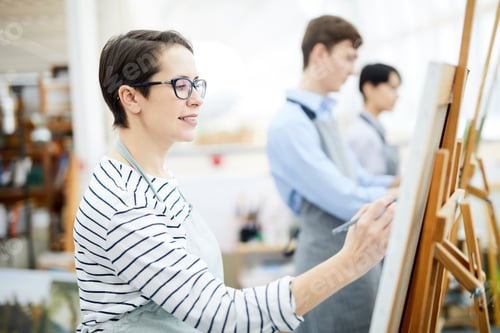 Preview: Woman Painting on Easel