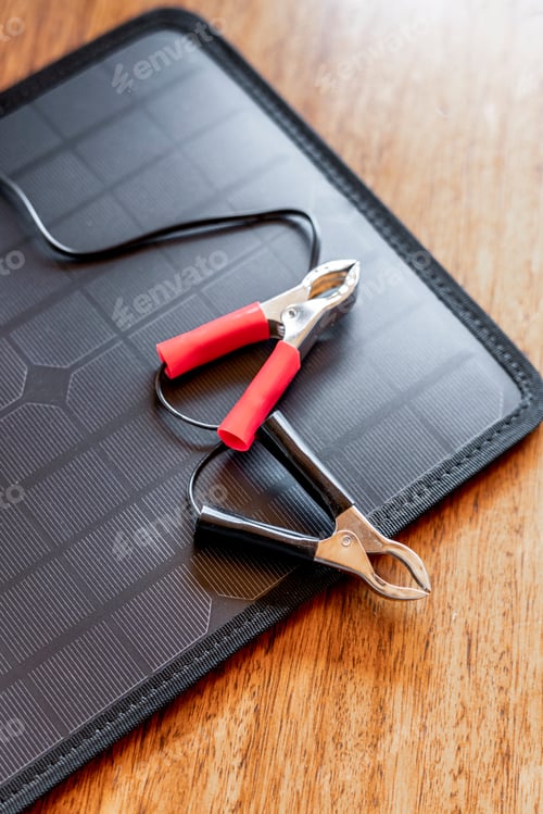Solar Panel with Red and Black Jumper Cables
