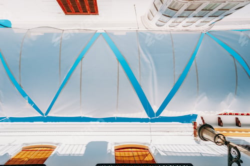 Preview: Nerja, Spain. White Cloth Is Stretched Between Houses On Old Narrow Street