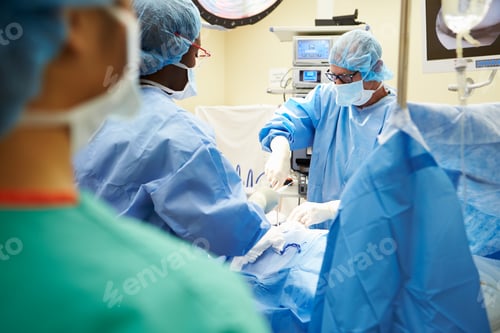 Preview: Surgical Team Working In Operating Theatre