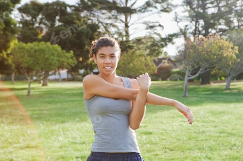 Preview: Runner stretching in field