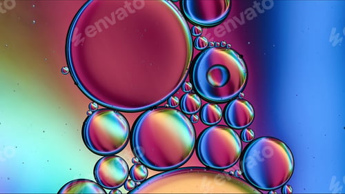 Preview: Abstract Colorful Food Oil Drops Bubbles and spheres Flowing on Water Surface
