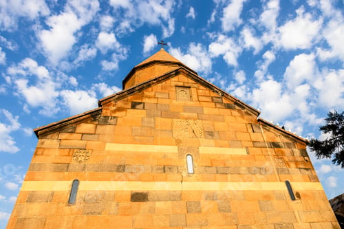 Preview: wall of Armenian church from yellow Armenian tuff