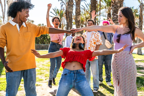 Preview: Multiethnic group of young happy friends hanging out