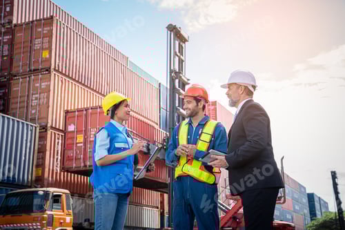 Preview: Container yard manager talking to foreman inside the warehouse