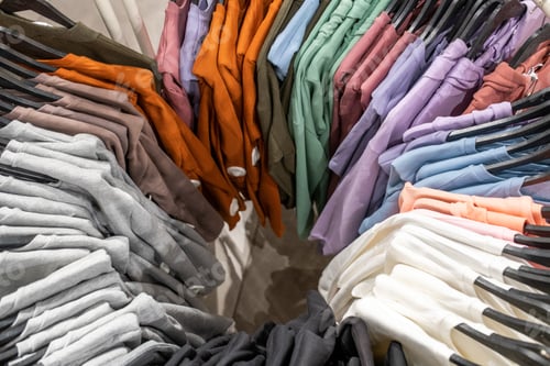 Preview: Variety of colorful clothes on hangers