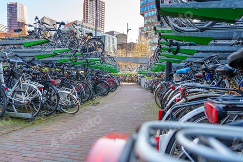 Preview: Large public bicycles parking. Old colorful bicycles in a parking lot. Netherlands, Germany.