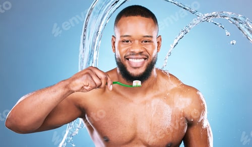 Preview: Black man, face and toothbrush with water splash and dental, brushing teeth and hygiene on blue bac