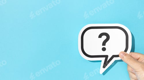 Preview: Hand holding a question mark on speech bubble on blue background. Copy space