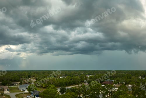Preview: Landscape of dark ominous clouds forming on stormy sky before heavy thunderstorm