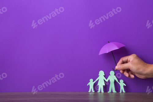 Preview: Hand holding a small purple umbrella.