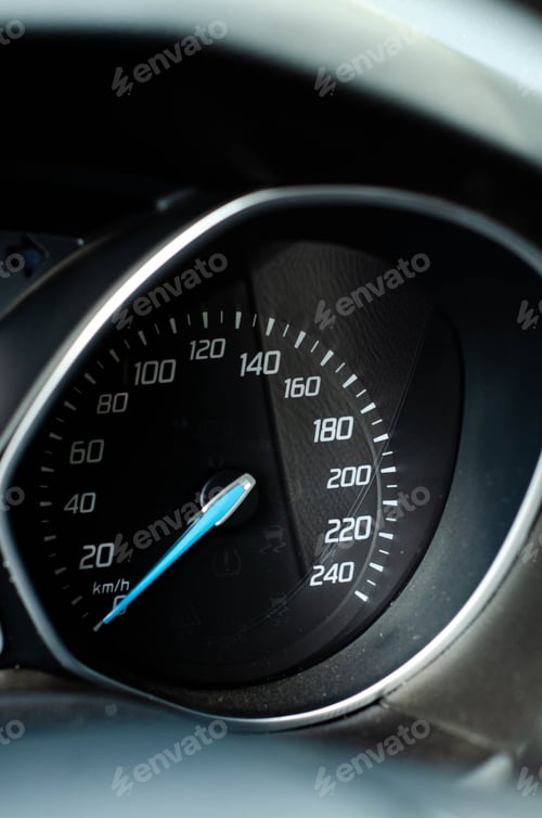 Preview: Closeup of a car dashboard with blue illuminated buttons