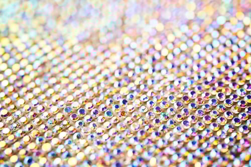 Preview: Abstract background made of rhinestones shimmering in the light.
