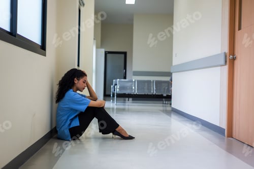 Preview: Doctor or Patients sitting on floor have depression. woman patient in a hospital is discouraged