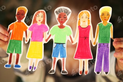 Preview: boy holding paper homemade garland of people of different races. Happy international children day
