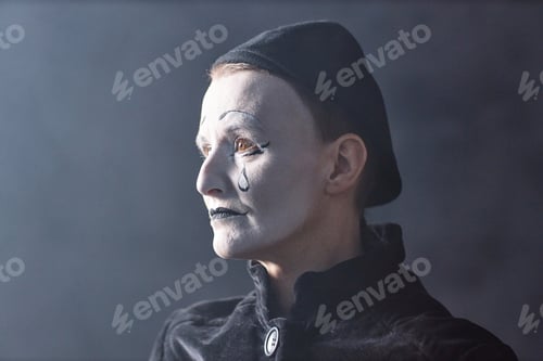 Preview: Headshot Mime Standing on Stage with Sad Face Makeup