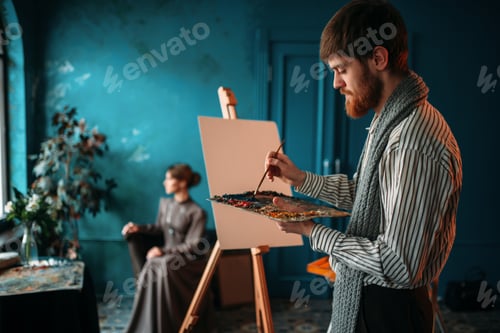 Preview: Male painter paints womans portrait