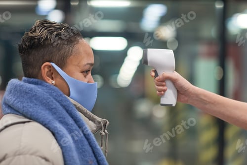 Preview: Woman checking her temperature
