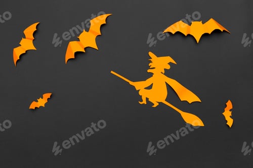 Preview: halloween and decoration concept - paper bats flying