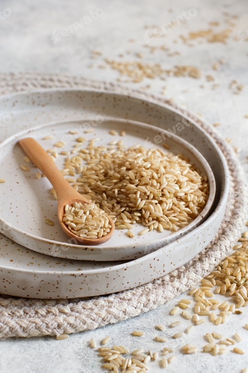 Preview: Brown rice on a plate with a spoon