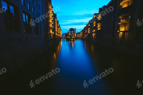Preview: Wide perspective of Warehouse District - Speicherstadt in twilight. Blue hour. Tourism landmark of