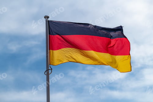 Preview: The national flag of Serbia waving in the blue sky